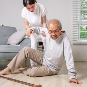helping old man up